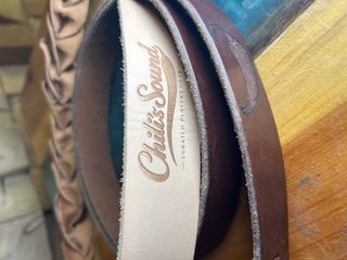 The Chili's Sound branding iron stamped into natural full-grain leather